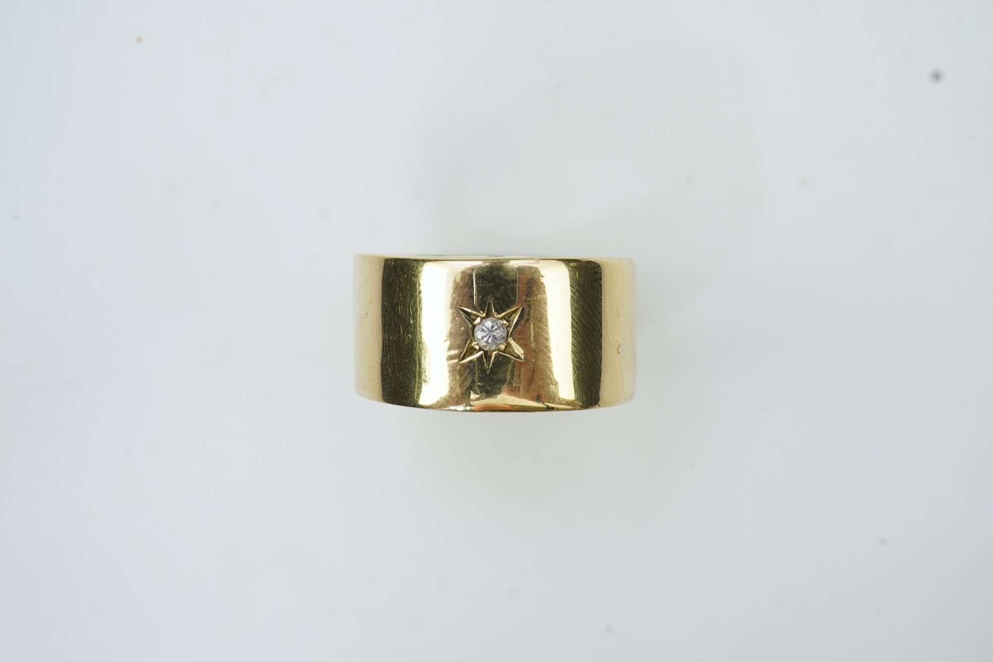 A gold and diamond ring